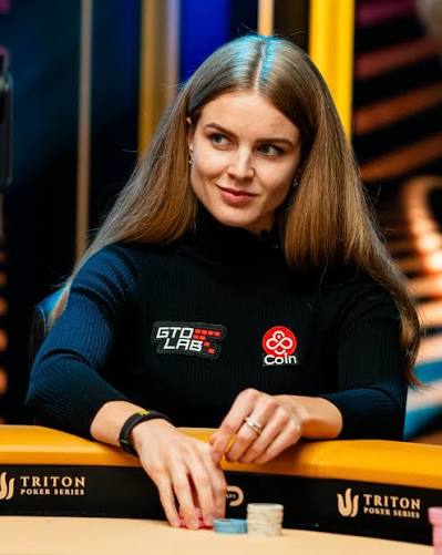 Player seated at a Triton Poker Series tournament table with chip stacks